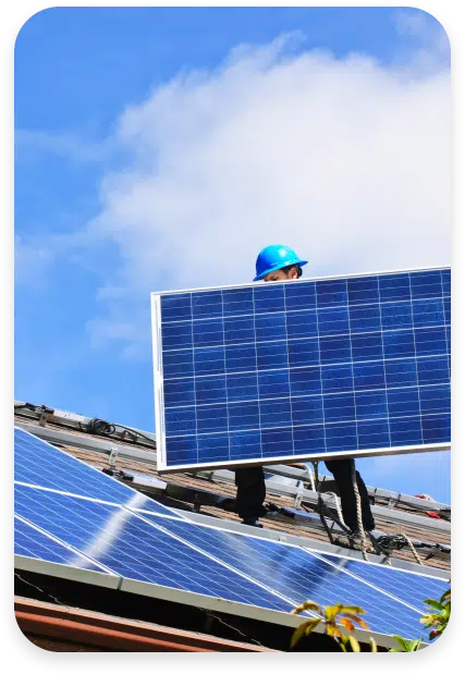 Worker Carrying Solar Panel